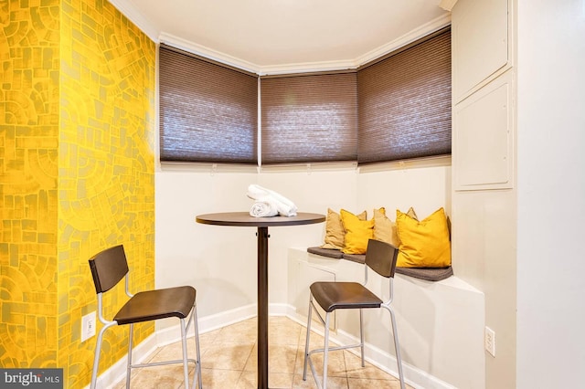 1337 Harvard St NW Unit 1, Washington, DC 20009 - tiled dining area with baseboards and crown molding