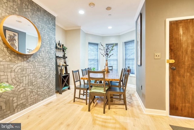 1337 Harvard St NW Unit 1, Washington, DC 20009 - dining area with wood finished floors, baseboards, recessed lighting, and ornamental molding