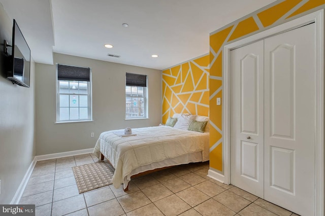 1337 Harvard St NW Unit 1, Washington, DC 20009 - bedroom featuring baseboards, light tile patterned floors, and recessed lighting