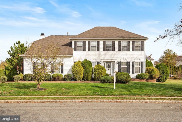 5 Primrose Dr, Burlington Township, NJ 08016 - colonial home with a chimney, a front lawn, and roof with shingles