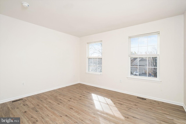 5 Primrose Dr, Burlington Township, NJ 08016 - spare room featuring light wood-style floors, a smoke detector, and baseboards