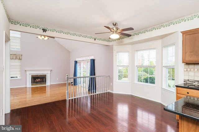 5 Primrose Dr, Burlington Township, NJ 08016 - unfurnished living room with a ceiling fan, dark wood finished floors, plenty of natural light, and lofted ceiling