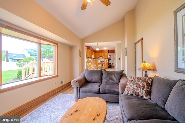 5 Wetherhill Way, Dayton, NJ 08810 - living room with light wood-style flooring, vaulted ceiling, a ceiling fan, and baseboards