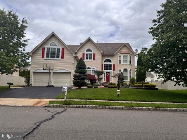 5 Wetherhill Way, Dayton, NJ 08810 - view of front of house with an attached garage and driveway