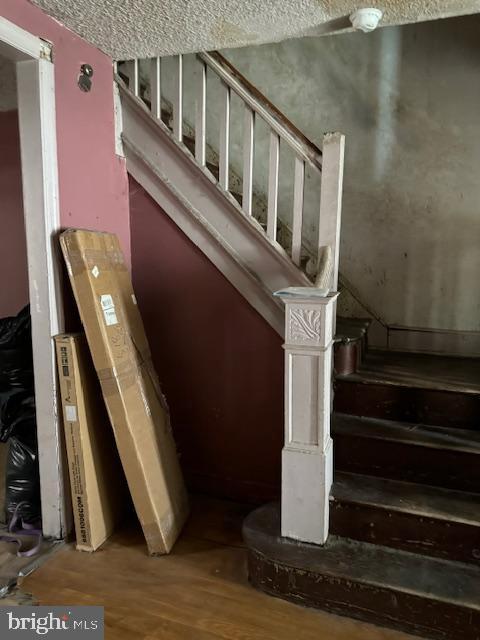 518 S 55th St, Philadelphia, PA 19143 - stairs with wood finished floors