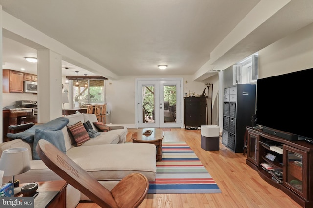 3615 22nd St N, Arlington, VA 22207 - living area with light wood-style floors and french doors