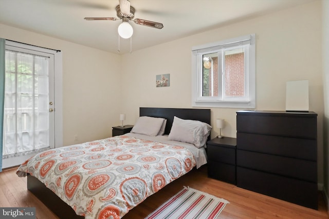 3615 22nd St N, Arlington, VA 22207 - bedroom with wood finished floors, access to outside, and ceiling fan