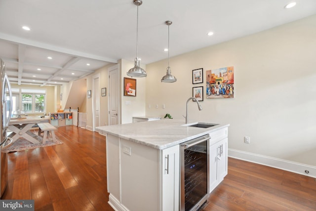 3615 10th St NW Unit A, Washington, DC 20010 - kitchen featuring beverage cooler, recessed lighting, dark wood-type flooring, a sink, and coffered ceiling