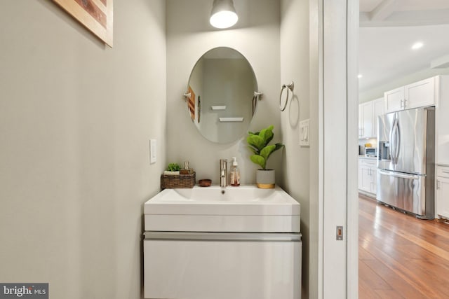 3615 10th St NW Unit A, Washington, DC 20010 - bathroom with hardwood / wood-style flooring, vanity, and recessed lighting