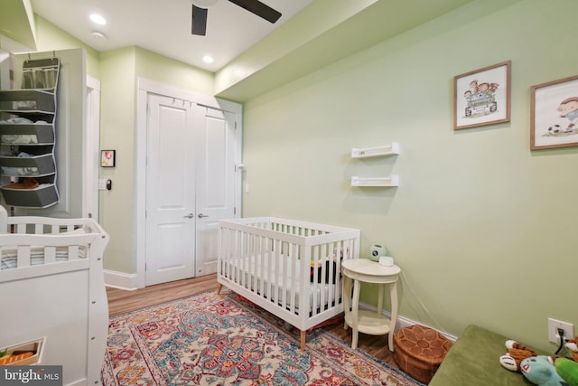 3615 10th St NW Unit A, Washington, DC 20010 - bedroom with wood finished floors, a closet, baseboards, a nursery area, and recessed lighting