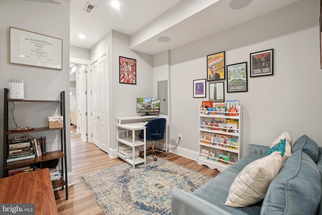 3615 10th St NW Unit A, Washington, DC 20010 - home office with wood finished floors, baseboards, electric panel, and recessed lighting
