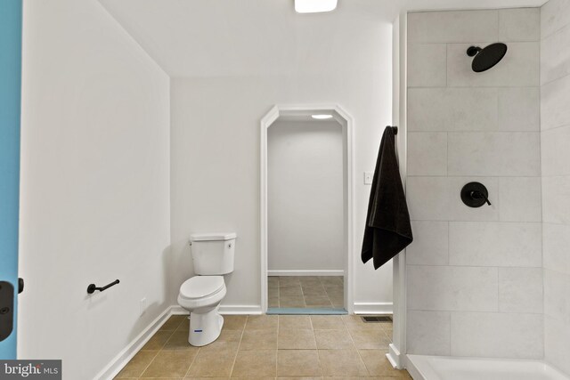 106 1st Ave, Lincoln University, PA 19352 - full bathroom featuring toilet, a tile shower, tile patterned flooring, and baseboards