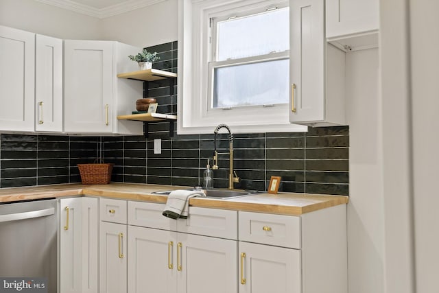 106 1st Ave, Lincoln University, PA 19352 - kitchen with stainless steel dishwasher, wooden counters, crown molding, decorative backsplash, and white cabinets