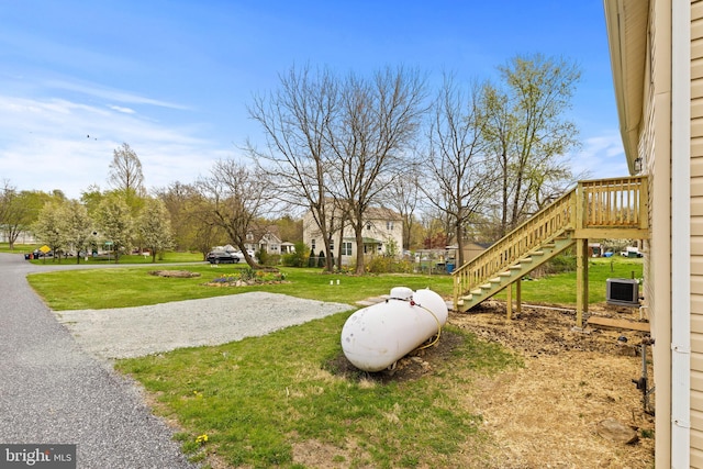 106 1st Ave, Lincoln University, PA 19352 - view of grassy yard featuring central air condition unit and stairs