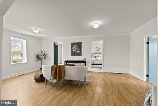 106 1st Ave, Lincoln University, PA 19352 - living room with ornamental molding, light wood-style flooring, and baseboards