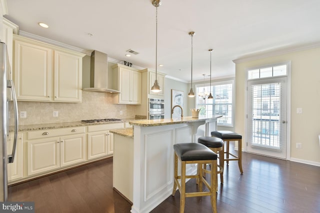 23492 Bluemont Chapel Ter, Ashburn, VA 20148 - kitchen featuring wall chimney exhaust hood, stainless steel appliances, dark wood finished floors, decorative backsplash, and crown molding