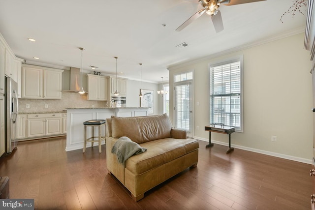 23492 Bluemont Chapel Ter, Ashburn, VA 20148 - living room with crown molding, a ceiling fan, dark wood-type flooring, recessed lighting, and baseboards