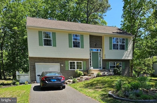 402 Siegfried, Chesilhurst, NJ 08089 - split foyer home featuring asphalt driveway and an attached garage