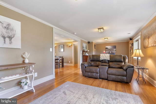 1104 N Pleasantview Rd, Pottstown, PA 19464 - living room featuring wood finished floors, ornamental molding, and baseboards