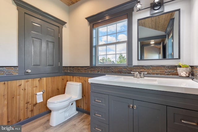 1104 N Pleasantview Rd, Pottstown, PA 19464 - bathroom featuring toilet, tasteful backsplash, wood finished floors, and vanity