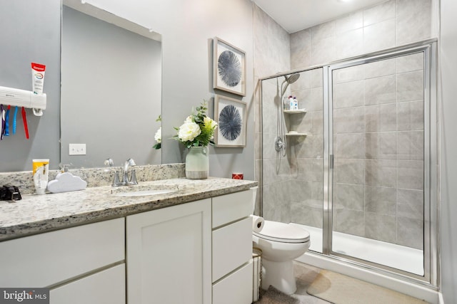 117 King St Unit A, Bensalem, PA 19020 - bathroom with a stall shower, vanity, toilet, and tile patterned flooring
