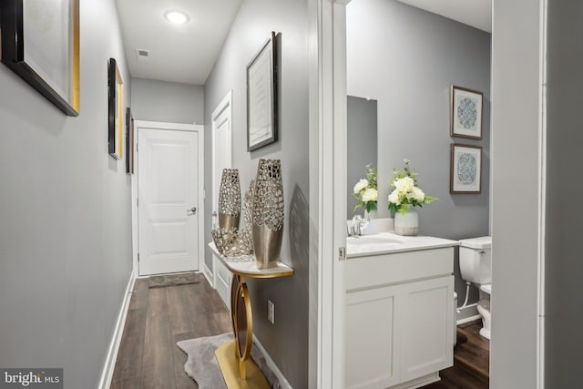 117 King St Unit A, Bensalem, PA 19020 - hallway with a sink, dark wood-style floors, baseboards, and recessed lighting