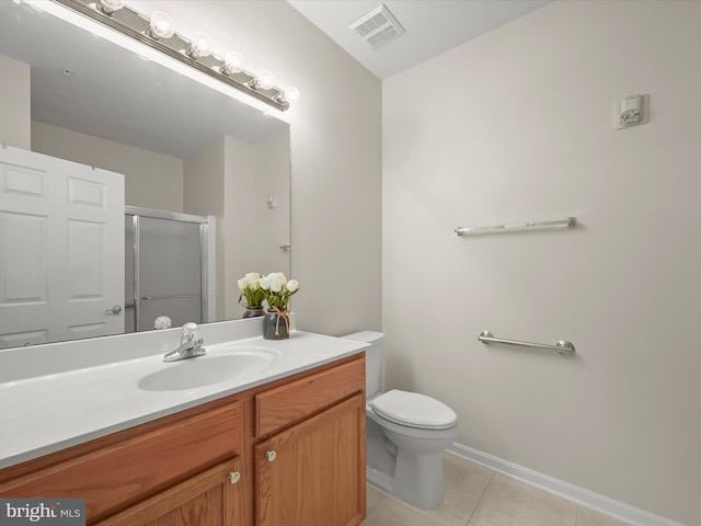 2608 Chapel Lake Dr Unit 112, Gambrills, MD 21054 - full bath featuring vanity, tile patterned floors, toilet, a shower stall, and baseboards