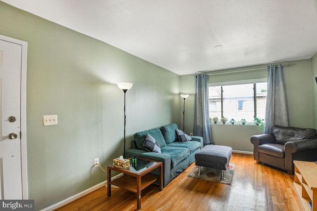 4212 Benning Rd NE Unit 5, Washington, DC 20019 - living area featuring wood finished floors and baseboards