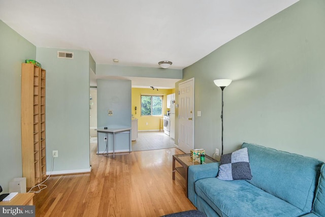 4212 Benning Rd NE Unit 5, Washington, DC 20019 - living room featuring wood finished floors and baseboards