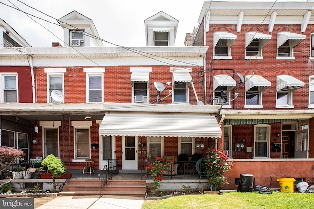 616 Chestnut Ave, Trenton, NJ 08611 - rear view of house featuring brick siding and covered porch