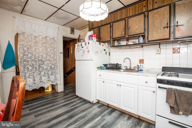 616 Chestnut Ave, Trenton, NJ 08611 - kitchen featuring white appliances, a sink, dark wood finished floors, light countertops, and decorative backsplash
