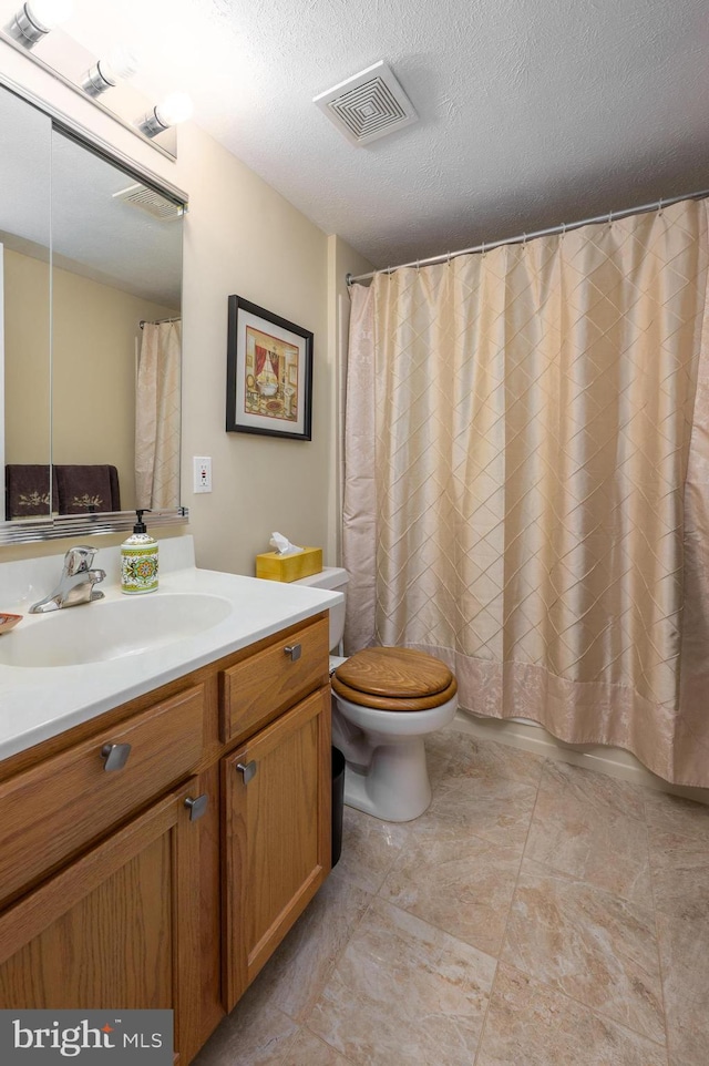 2006 Staghorn Dr, Mount Laurel, NJ 08054 - full bathroom with toilet, vanity, a textured ceiling, and a shower with curtain