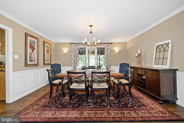 59 Carter Rd, Thornton, PA 19373 - dining space featuring dark wood-style floors, a chandelier, ornamental molding, wainscoting, and a decorative wall