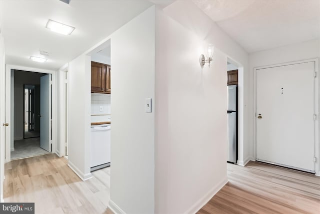 801 N Howard St Unit 305, Alexandria, VA 22304 - corridor featuring light wood finished floors and baseboards