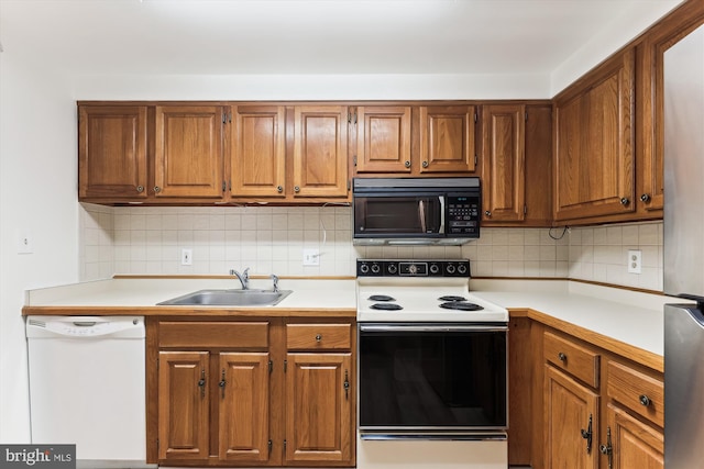 801 N Howard St Unit 305, Alexandria, VA 22304 - kitchen featuring black microwave, dishwasher, electric range, a sink, and light countertops