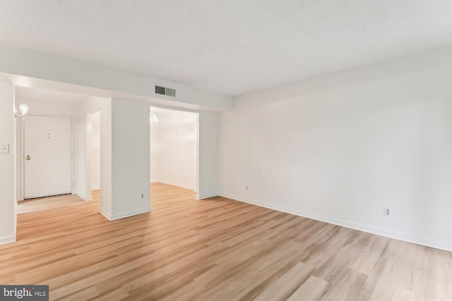 801 N Howard St Unit 305, Alexandria, VA 22304 - empty room with light wood-type flooring and baseboards