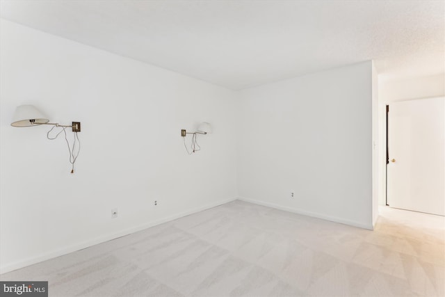 801 N Howard St Unit 305, Alexandria, VA 22304 - unfurnished room with light carpet and baseboards