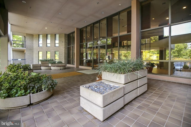 801 N Howard St Unit 305, Alexandria, VA 22304 - common area with a towering ceiling and expansive windows
