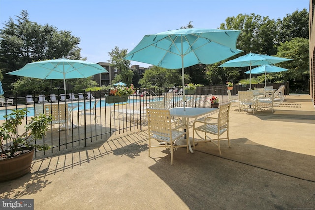 801 N Howard St Unit 305, Alexandria, VA 22304 - community pool with a patio