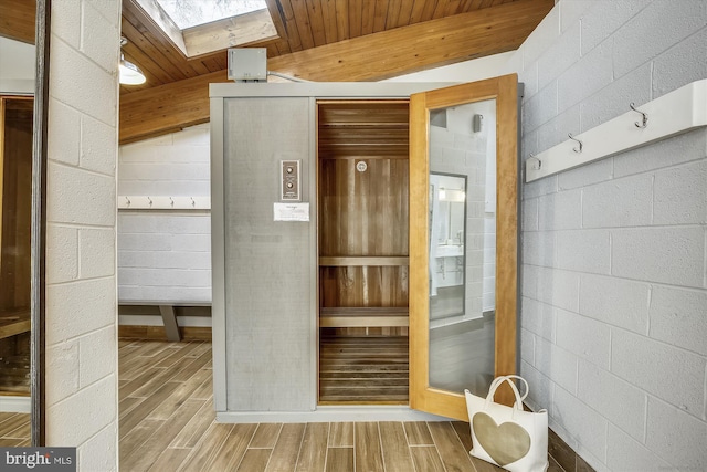 801 N Howard St Unit 305, Alexandria, VA 22304 - relaxing sauna / steam room with a skylight, wood finished floors, and wooden ceiling