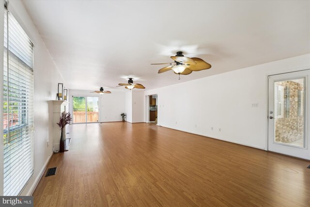 6775 Amherst Rd, Bryans Road, MD 20616 - unfurnished living room with a ceiling fan and wood finished floors