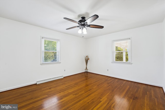 6775 Amherst Rd, Bryans Road, MD 20616 - spare room with baseboard heating, hardwood / wood-style floors, baseboards, and a ceiling fan