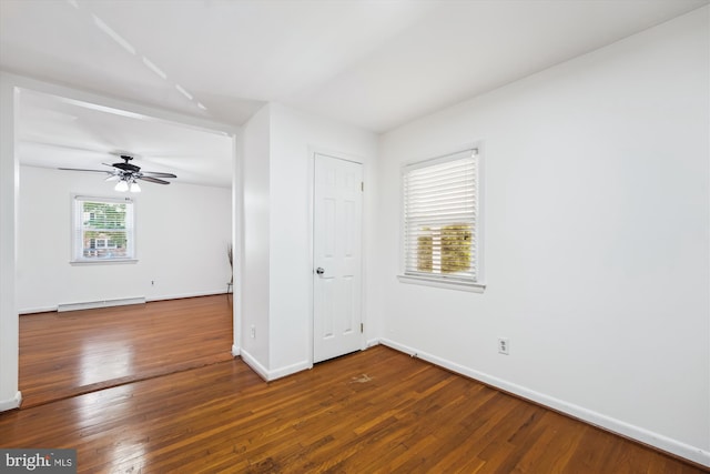 6775 Amherst Rd, Bryans Road, MD 20616 - spare room with a baseboard heating unit, baseboards, wood finished floors, and a ceiling fan