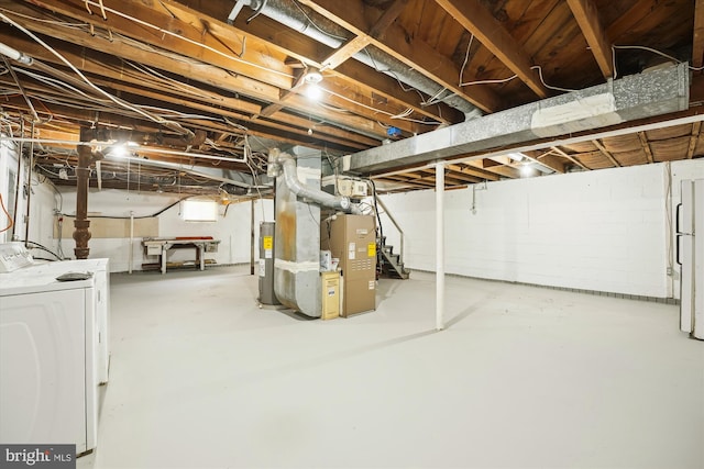 6775 Amherst Rd, Bryans Road, MD 20616 - unfinished basement with electric water heater, stairway, independent washer and dryer, freestanding refrigerator, and heating unit