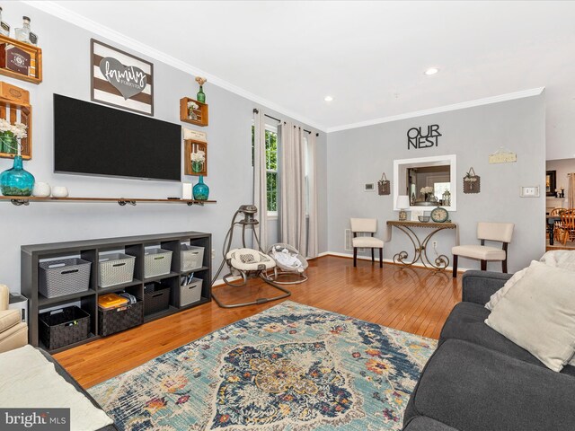 1501 Rambling Way, Frederick, MD 21701 - living area featuring ornamental molding, wood finished floors, and recessed lighting