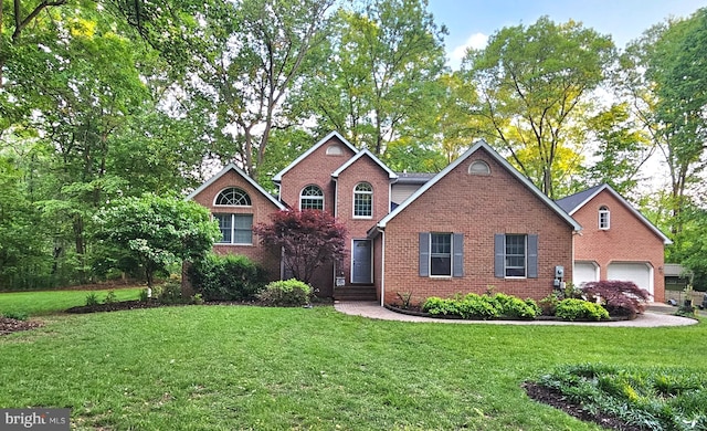 16245 River Bend Ct, Williamsport, MD 21795 - traditional-style house with brick siding, a front yard, and a garage