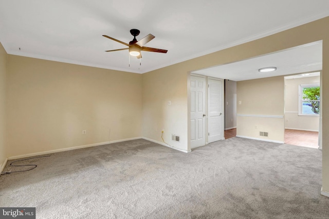 8760 Stoneridge Dr, Manassas, VA 20111 - carpeted spare room with ceiling fan, crown molding, and baseboards