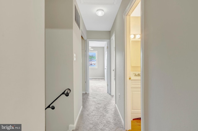 8760 Stoneridge Dr, Manassas, VA 20111 - hallway featuring light colored carpet and baseboards