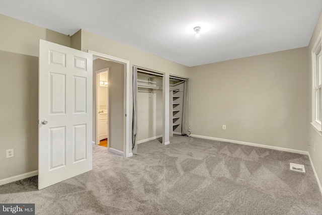 8760 Stoneridge Dr, Manassas, VA 20111 - unfurnished bedroom featuring carpet flooring, a closet, and baseboards