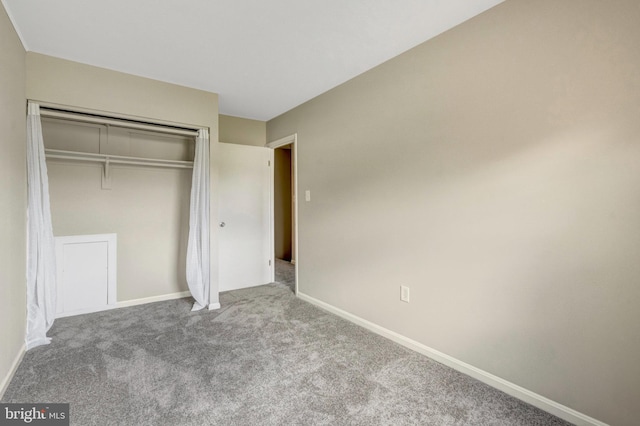 8760 Stoneridge Dr, Manassas, VA 20111 - unfurnished bedroom featuring carpet, baseboards, and a closet